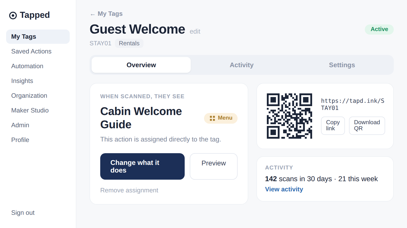 Tapped tag detail page showing what visitors see when they scan, the QR code, and recent activity